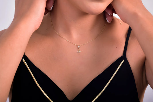 Dije Mariposas Esmeralda 0.01Qts | 0.6gr | Oro Amarillo (Gemas)