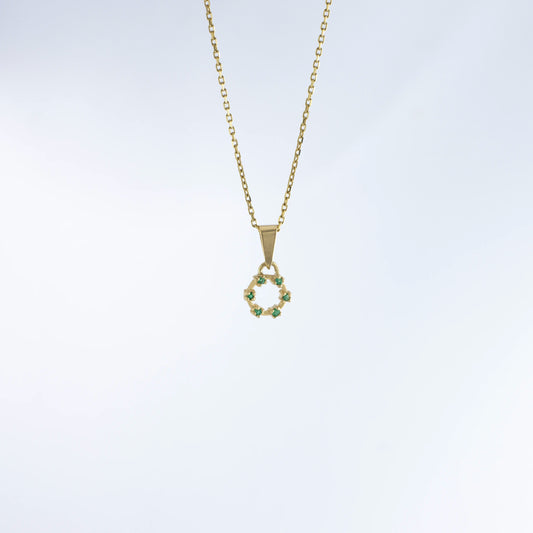 Dije Sol Esmeralda 0.03Qts | 0.6gr | Oro Amarillo (Gemas)